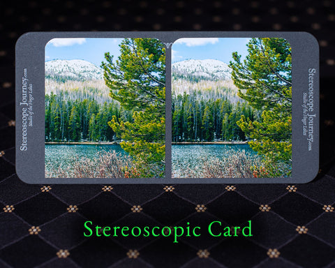 snowy mountain and lake scene in Summertime